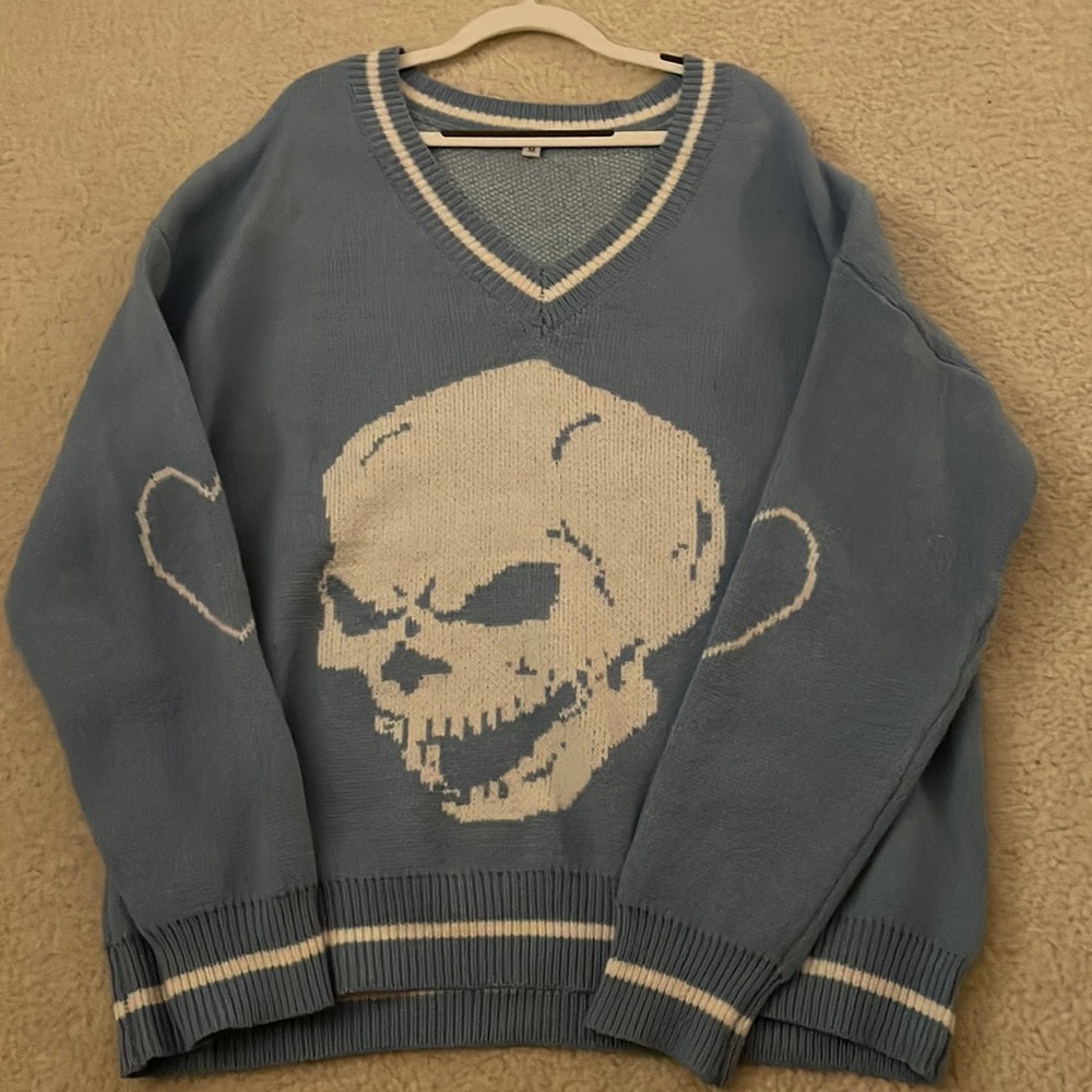 light blue skull sweater